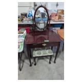 Mirrored vanity with stool