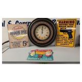 Advertising Signs And Clock As Shown