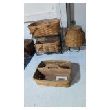 Four longaberger baskets with metal stands
