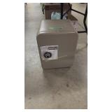 Small sentry floor safe. Door is unlocked no