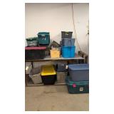 Lot Of Plastic Storage Totes Located On Top Of