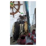 Vintage golf clubs and snow skis