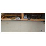 Tools Etc On Bottom Shelf Of Workbench