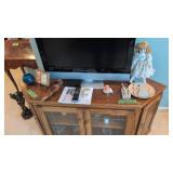 Dolls Plate Decorative Items On Top Of Tv Stand