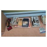Lot Of Knives Silverware Dishes Etc As Shown