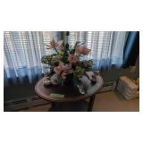 Artificial Flower Arrangement And Items On Top