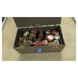 Trunk with various advertising tins