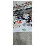 Oil lamp coin counting tubes books etc