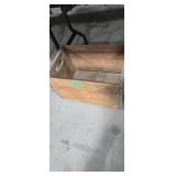 Pepsi cola wooden crate under table