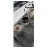 Three antique Crocs various sizes located under