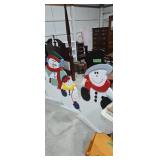 Three wooden snowmen