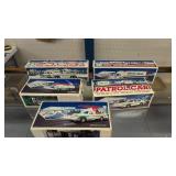 Five Vintage Hess Trucks And Cars