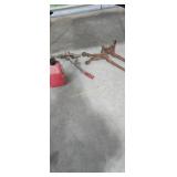 Come along and gas can under table