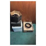 Vintage hats blankets clothing in closet