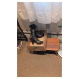 Items on floor and wall antique ladies shoes