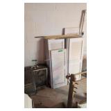 Lot of plastic shutters and box fan