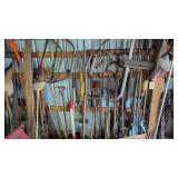 Items on right side wall large lot of yard tools