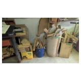 Lot of wood located under lathe and on floor as