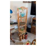 Wooden shelf with glassware and vases