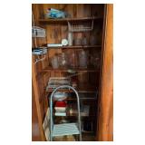 Contents of closet step stool glassware books etc