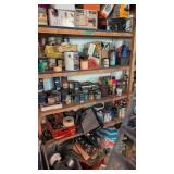 Items on wooden shelving paint linens pots pans
