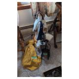 Doll rocking chairs with Christmas figure and doll