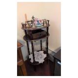 Small stand with brass bells and jewelry box