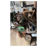 Bench grinder hand tools etc on workbench