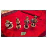 Four Hummel figures