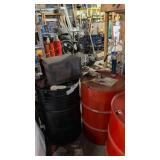 2-55 Gallon Drums One Contains Oil And Has Pump