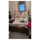 Queen size bed with bedding