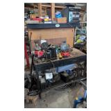 Workbench With Stereo Parts On Floor Radiators Etc