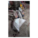 Two Bags Of Wood Pellets And Charcoal