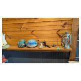 Items on shelf football pictures lantern etc