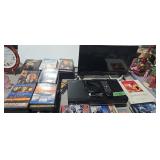DVD VHS player with flat screen TV and DVDs