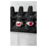 Pair of sterling silver rings with Ruby stones