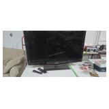 Samsung flat screen TV with remote 46 in