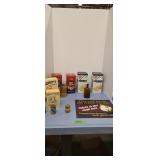 Advertising tins and sign as shown