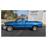 2003 GMC pickup showing 106,118 mi estate vehicle