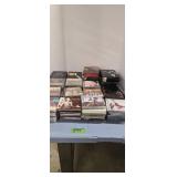 Lot of CDs and VHS tapes