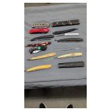 Various Penn knives and straight razors