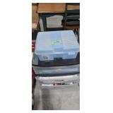 Plastic storage totes with blankets etc