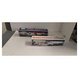 Two Hess trucks as shown