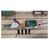 Vintage ammo boxes and bird figure as shown