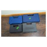 Four plastic pistol boxes