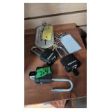 Three Master locks with keys