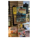 Items on wall cleaning kits sporting posters as