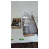 Plastic display stand and boxes of screws