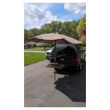 Recreational table with umbrella mounts in your