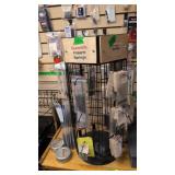 Revolving display rack with firearm springs